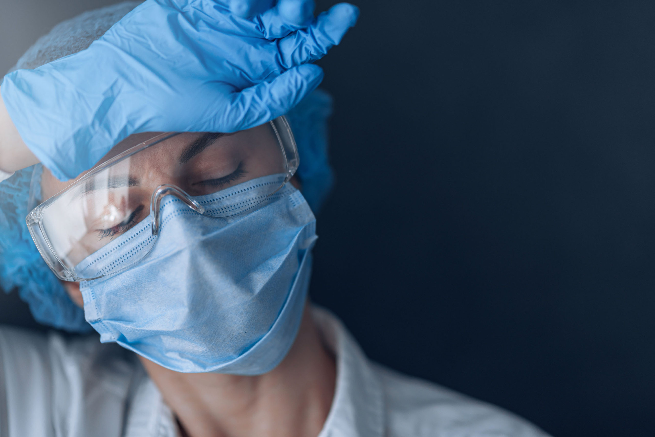 tired medical worker doctor after taking a large number of patie